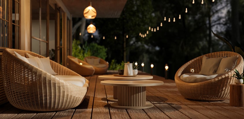 Round rattan chairs on deck night